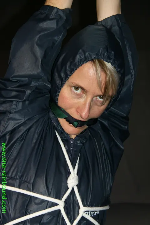 Thick Bound Woman in Rain Gear with Cleave Gag – photo 9 of 16