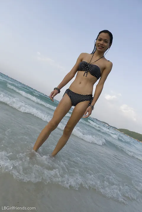 Busty Asian Trans Woman Strips Out of Her Bikini on the Beach – photo 13 of 16