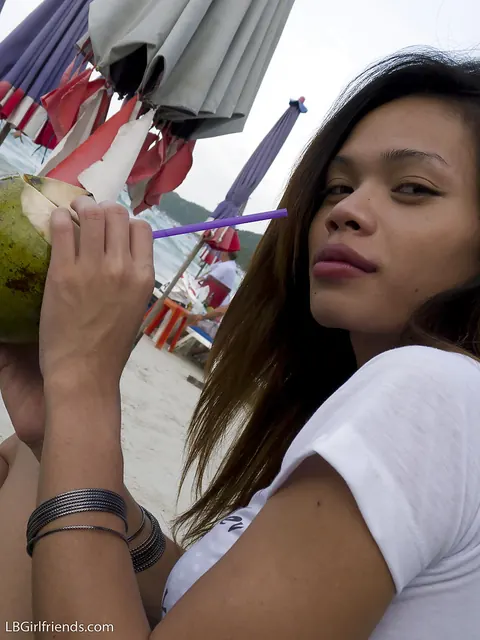 Busty Asian Trans Woman Strips Out of Her Bikini on the Beach – photo 5 of 16