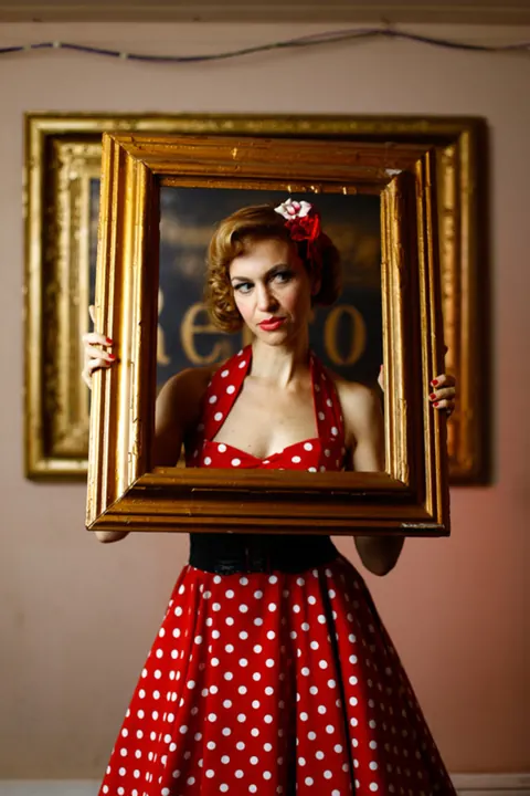 Short-Haired Redhead Poses in a Dress and Heels – photo 15 of 20