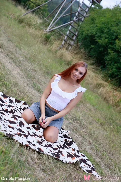 Redhead Strips Out of Her Skirt and Spreads Her Shaved Pussy Outdoors – photo 2 of 15
