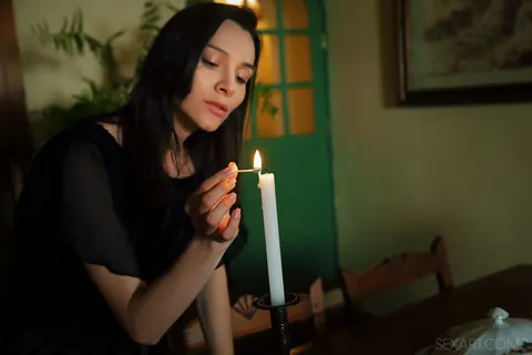 Adel Morel: Brunette Lights a Candle and Masturbates with a Dildo – photo 1 of 12