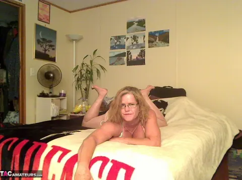 Misha Milf: Chubby Redhead MILF Works a Dildo in Bed Wearing a Bikini and Glasses – photo 1 of 20