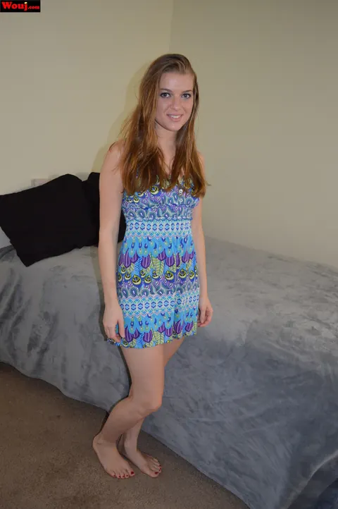 Woman Poses in Clothes and Pulls Her Top Down – photo 1 of 15
