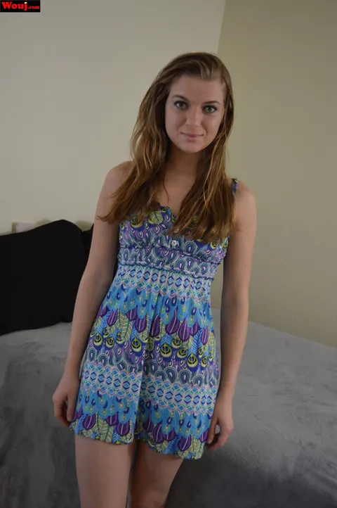 Woman Poses in Clothes and Pulls Her Top Down – photo 3 of 15