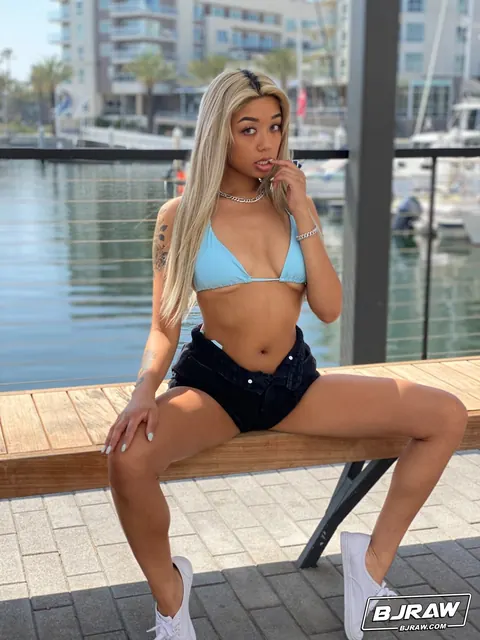 Gia DiBella: Busty Ebony Blonde in a Bikini and Shorts Takes a Facial – photo 1 of 21