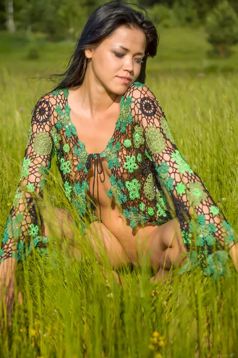 Brunette Undresses and Poses Nude in a Forest Meadow – photo 3 of 21