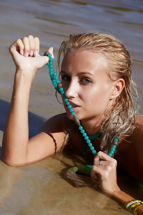 Petite Babe Lifts Her Skirt and Spreads on the Beach – photo 7 of 21
