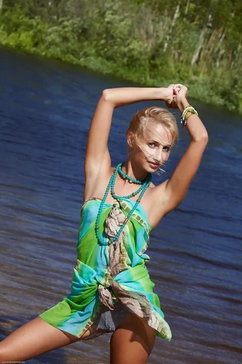 Petite Babe Lifts Her Skirt and Spreads on the Beach – photo 4 of 21
