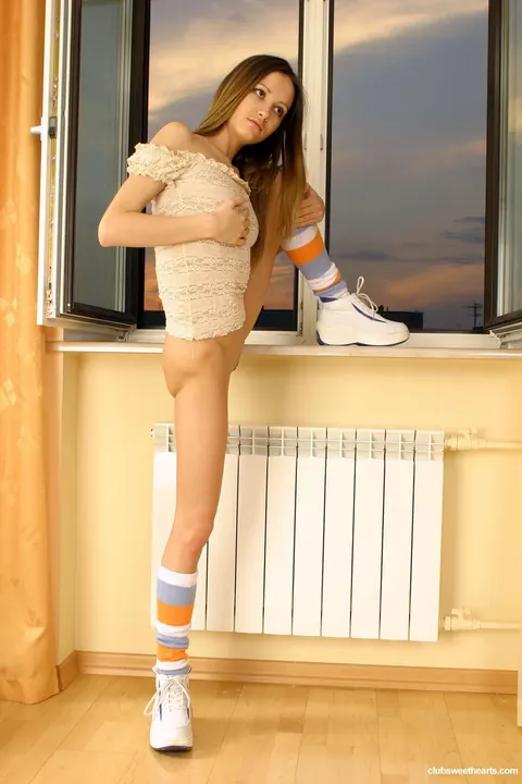 Skinny Woman in Socks Pulls Panties Aside and Spreads Her Pussy – photo 12 of 20