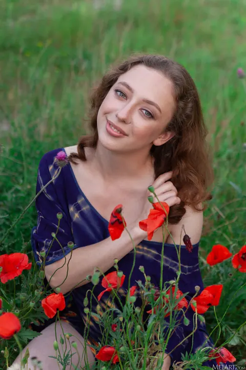 Busty Curly Woman in a Skirt Spreads in the Forest – photo 3 of 21