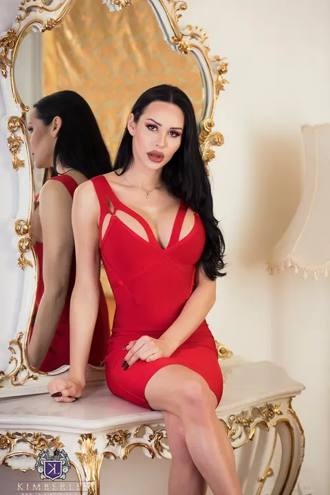 Trans Woman Drops Her Skirt and Poses Nude Showing Cock – photo 1 of 16