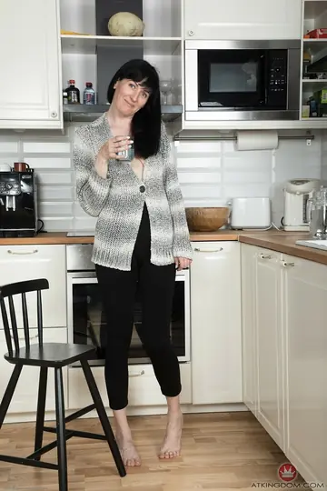 Tall Pale MILF Strips in the Kitchen and Fingers Her Shaved Pussy