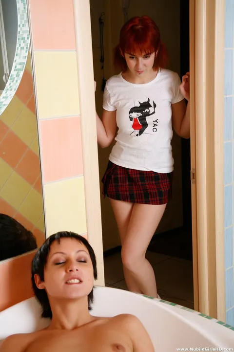 Redhead Lesbians Strip, Finger, and Share a Dildo in the Bathroom – photo 4 of 21