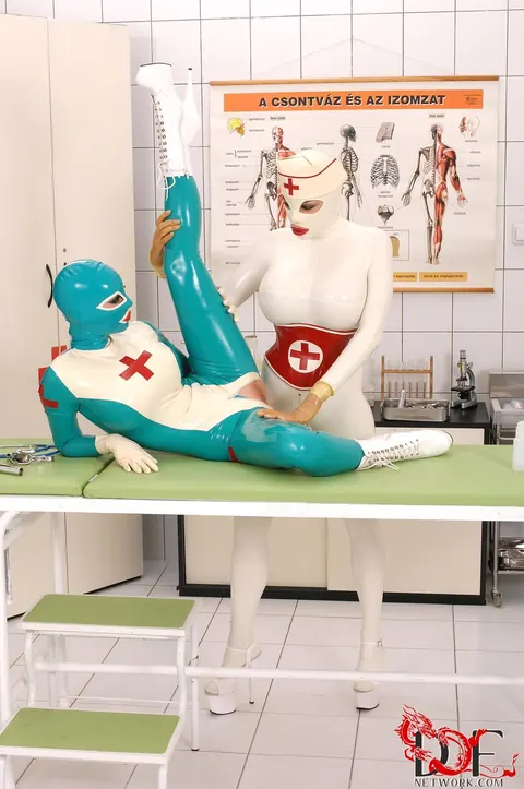 Clanddi Jinkcego: French Blonde and British Brunette in Latex Bondage Spread – photo 11 of 21