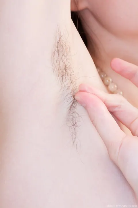Slender Brunette Bares Her Hairy Bush and Fingers Herself in the Kitchen – photo 11 of 21