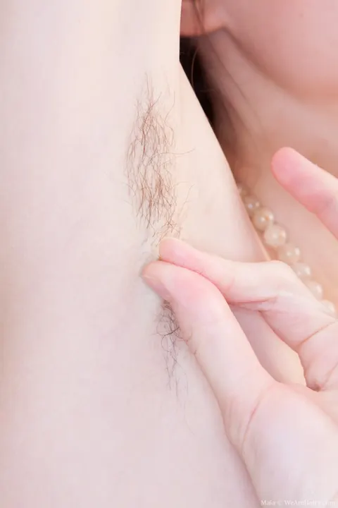 Slender Brunette Bares Her Hairy Bush and Fingers Herself in the Kitchen – photo 10 of 21