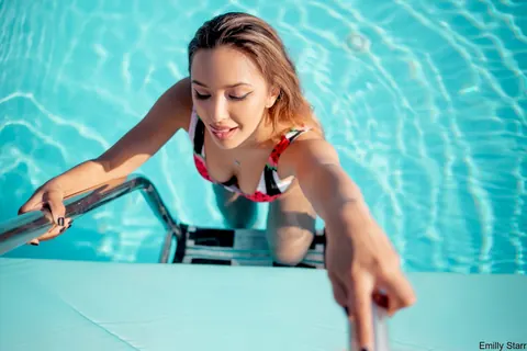 Emilly Starr: Blonde in a Bikini Poses by the Pool Wearing Glasses – photo 14 of 18