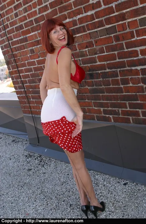 Busty Redhead MILF Undresses Outdoors in Lingerie and Stockings – photo 7 of 12