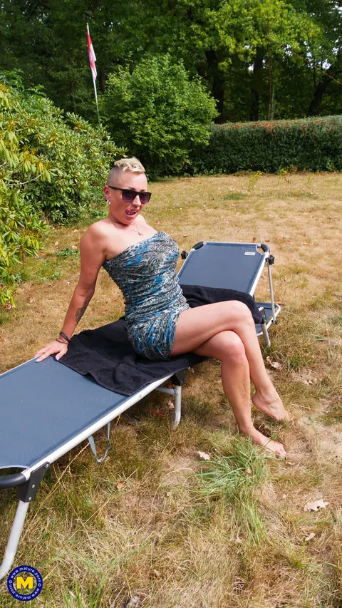 Mandy Mystery: Curvy Blonde MILF Masturbates on a Garden Chair – photo 2 of 11