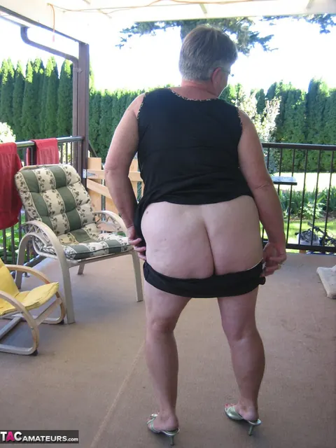 BBW MILF with Short Hair Undresses and Spreads Her Pussy – photo 9 of 20