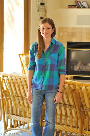 Redhead Shows Off Her Small Natural Tits in Jeans