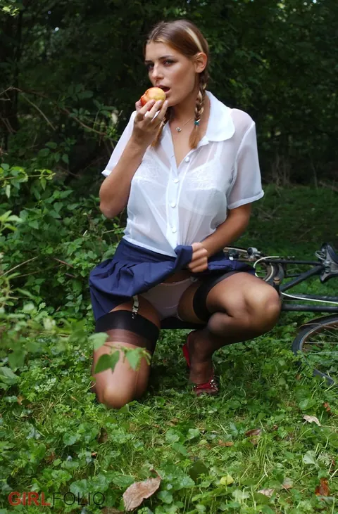 Busty Woman Strips Out of Her Uniform and Stockings Outdoors – photo 2 of 12