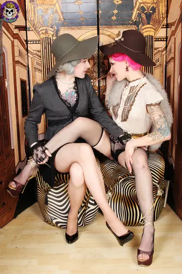 Tattooed MILFs in Stockings Kiss and Lick Pussy