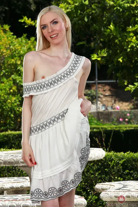 Celestina Blooms: Petite Blonde Bends Over to Show Her Shaved Pussy Outdoors – photo 4 of 21