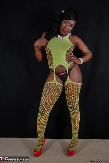Thick Ebony MILF Strips in Stockings and Red Heels