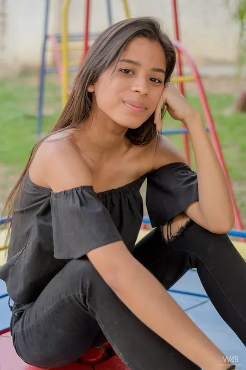 Karin Torres: Latina Brunette Sits on a Swing in Ripped Jeans – photo 12 of 16