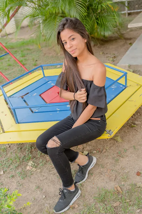 Karin Torres: Latina Brunette Sits on a Swing in Ripped Jeans – photo 7 of 16
