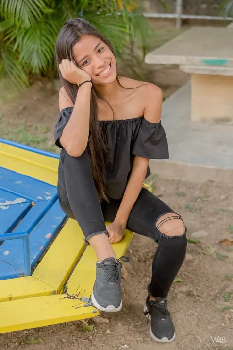 Karin Torres: Latina Brunette Sits on a Swing in Ripped Jeans – photo 9 of 16