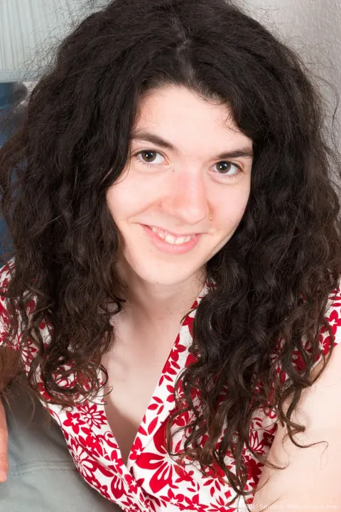 Silki Smith: Curly Brunette in Heels Strips and Spreads Her Hairy Crotch – photo 2 of 21