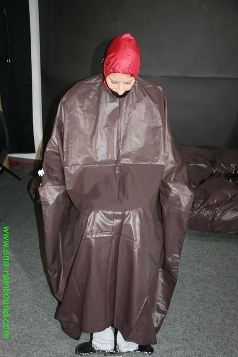 Amateur Bound and Gagged in Raincoat and Socks on a Chair – photo 10 of 16