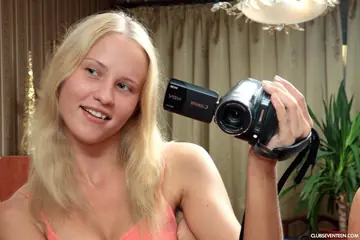 European Blonde Peels Off Her Top and Poses Nude with Natural Tits