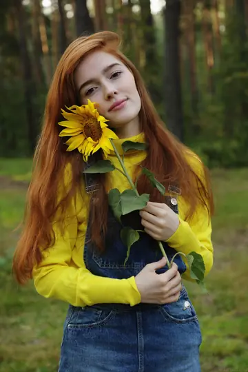 Pale Russian Redhead Shows Off Her Small Tits and Tattoo