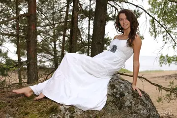 Tall European Strips Off Her Skirt and Spreads on a Rock