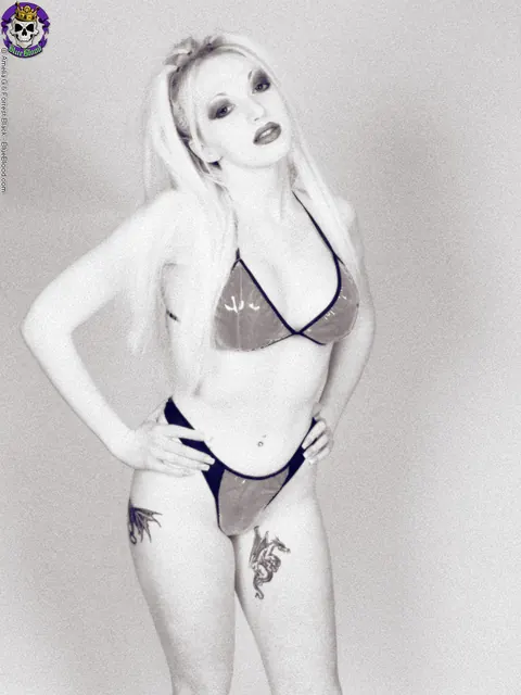 Cali Ford: Busty Blonde MILF Strips Out of Her Bikini to Reveal Lingerie – photo 1 of 16