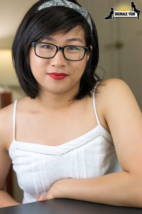 Asian Trans Woman Lets Dress Fall and Stands Nude – photo 2 of 16