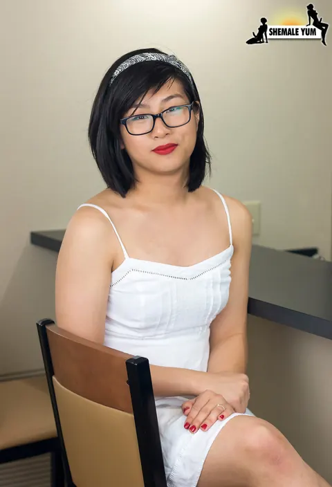Asian Trans Woman Lets Dress Fall and Stands Nude – photo 1 of 16