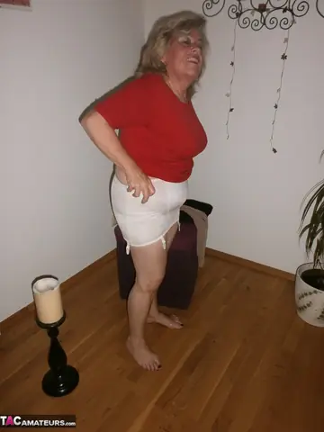 Mature European Blonde in Stockings and Heels Fingers Her Hairy Pussy