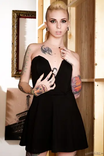 Brunette Strips Out of Her Dress and Spreads Her Tattooed Pussy