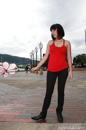 Short-Haired Latina Pulls Panties Aside and Fingers Her Pussy Outdoors