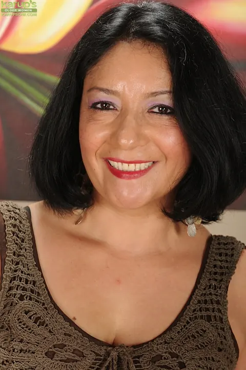 Isis Fajardo: Mature Brunette with Big Tits Spreads in Black Stockings – photo 1 of 16