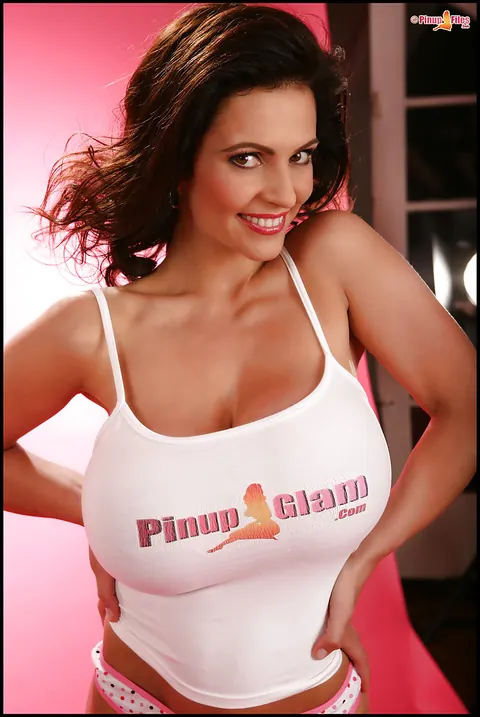 Denise Milani: Thick Brunette Poses in Panties Showing Her Big Enhanced Tits and Ass – photo 10 of 16