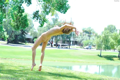 Slim Gymnast Strips Out of Her Jeans on the Lake Beach – photo 13 of 21