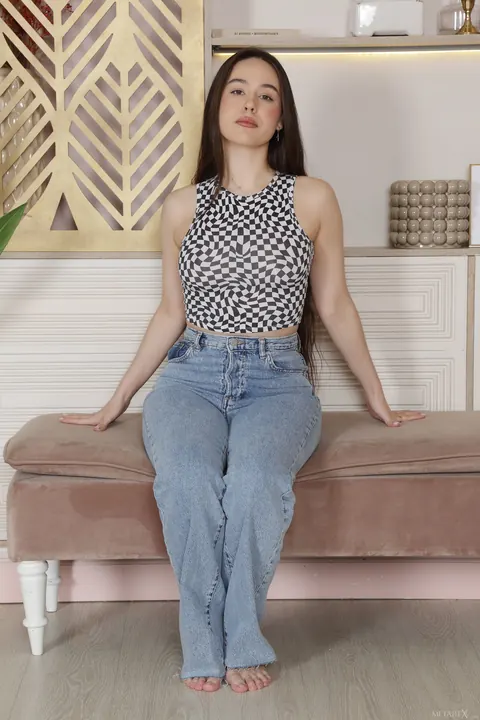 Emily Eliot: Thick Brunette in Jeans Strips and Fingers Her Pussy – photo 1 of 20