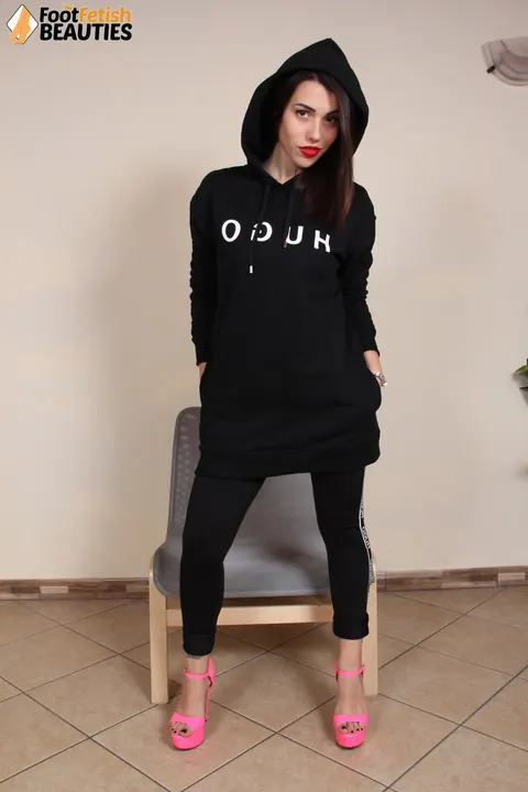 European Brunette Purses Her Red Lips and Removes Her High Heels – photo 1 of 12