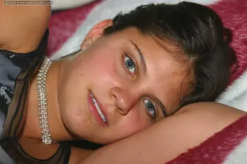 Brunette Bares Her Trimmed Pussy and Spreads Wide